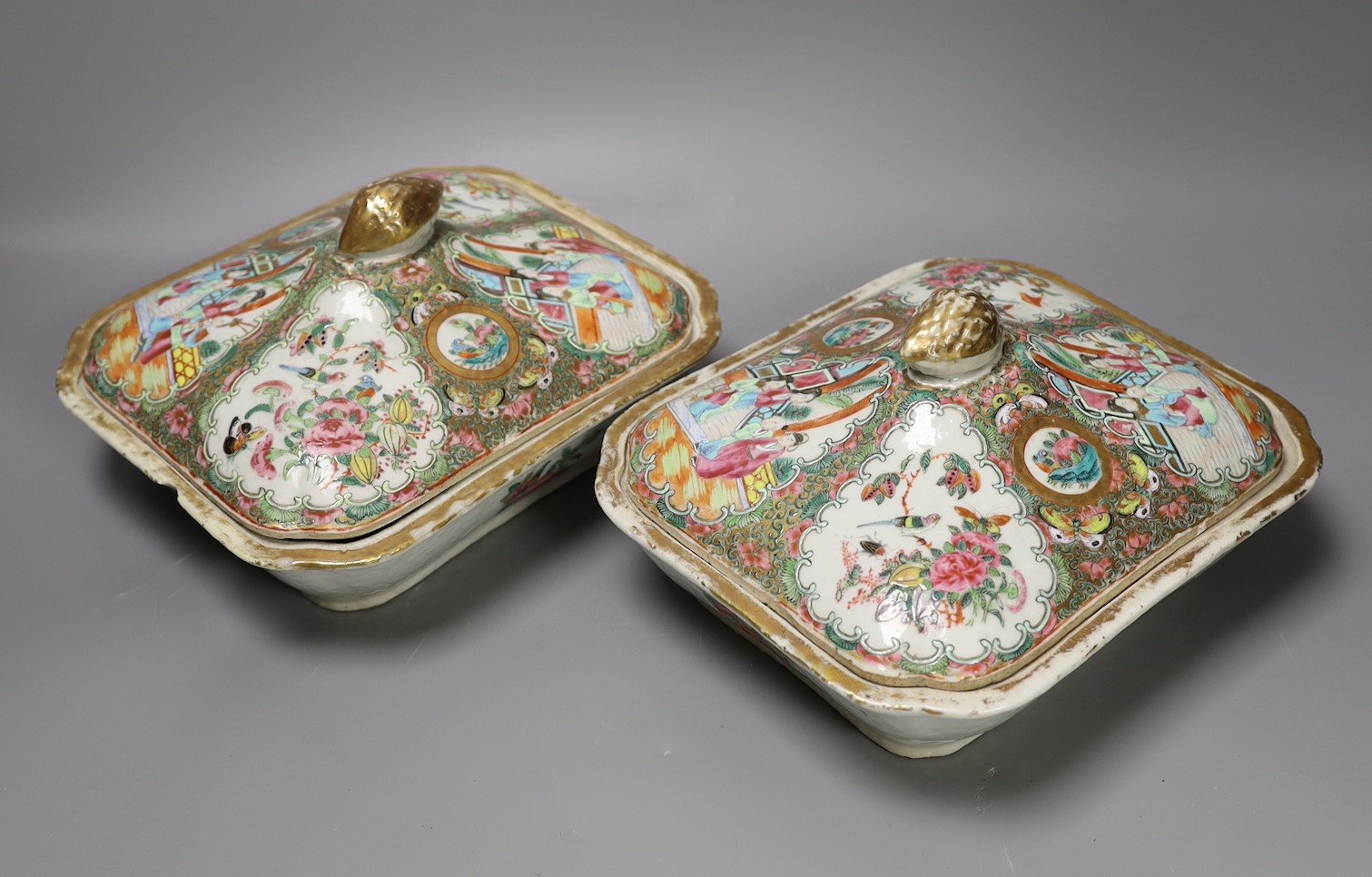 A pair of 19th century Chinese Canton decorated famille rose lidded tureens, 24cm long